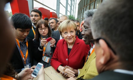Chancellor Angela Merkel signed autographs in the crowd during a Integration Conference at the CDU-Party central on October 22, 2014 in Berlin.