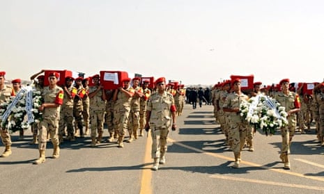 The coffins of 31 Egyptian soldiers killed in the Sinai peninsula o