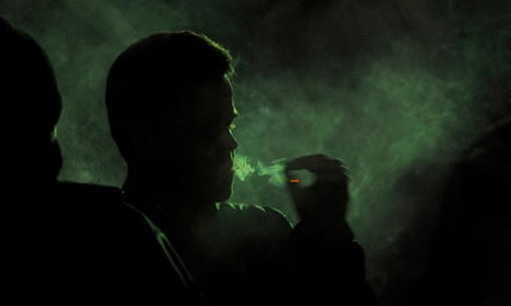 Denver man smoking joint at Snoop Lion concert
