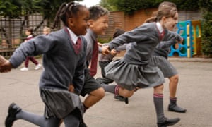 Children running in a playground