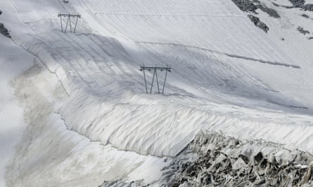 A textile cover prevents snow melting in the Italian Alps