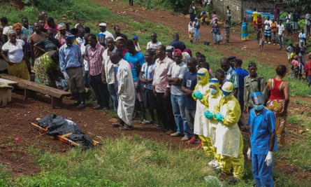 Prayers are made for a victim of Ebola in Freetown.
