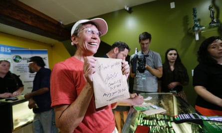 Deb Greene, the first customer at the Cannabis City marijuana shop in Seattle, Washington in July, after the state legalised marijuana for recreational use.