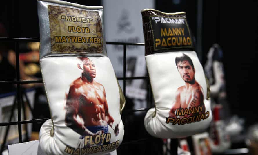Boxing gloves featuring Floyd Mayweather Jr and Manny Pacquiao are seen during the Box Fan Expo at the Las Vegas Convention Center last month.