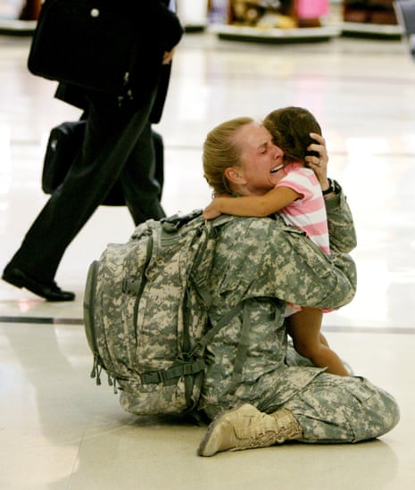 That's me in the picture: Major Terri Gurrola embraces her daughter on her return from service in Iraq | Photography | The Guardian