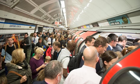 Commuters board an underground train during a staff strike in April earlier this year. Photograph: Ollie Millington/Getty Images