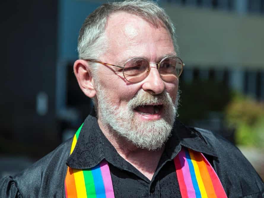 Gay marriage advocate Bruce McKinney waits outside the Sedgwick County Courthouse in Wichita, Kan., Monday, Oct. 6, 2014, in case a gay couple would want him to marry them.