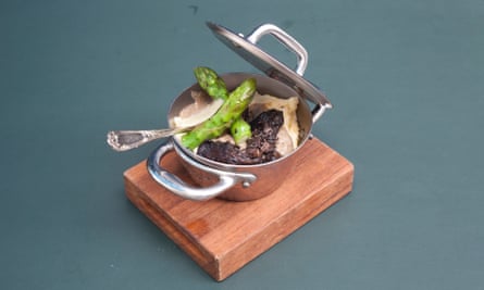 Mini polenta in a metal pot with the lid ajar
