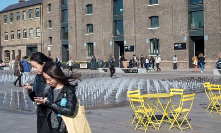 'Children from surrounding estates run through Granary Square's fountains unchecked by security guards.'