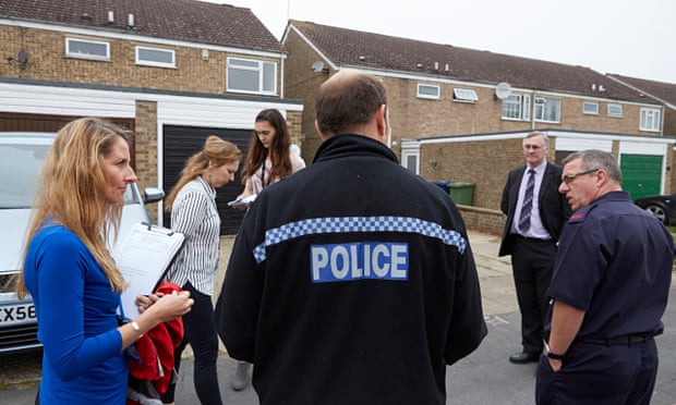 Fenland district council officers, police and fire fighters carry out house inspections in 