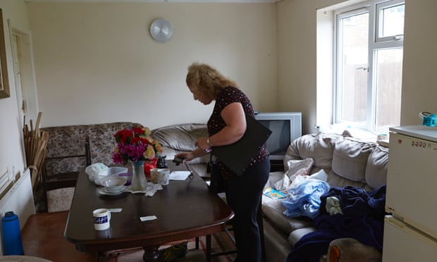 A Fenland district council officer on a house inspection ... poor housing and exploitation are usually linked. Photograph: Andy Hall for the Guardian