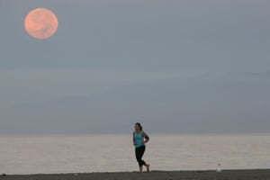 Blood moon and jogger