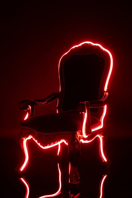 The Electric Louis, hand carved in mahogany, lacquered and adorned in neon
