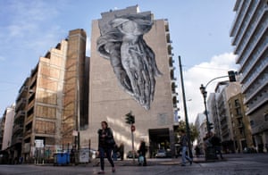 A blessing from above? Athens is anointed by a graffiti artist who is perhaps worthy of higher praise