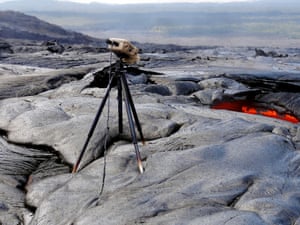 A time-lapse camera which USGS Hawaii Volcano Observatory scientists were using to monitor a lava tube skylight melts after being caught in a lava overflow