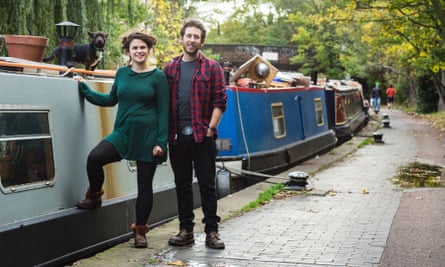 Emily Morus-Jones and her boyfriend stand by their boat near Camden Lock in north London.