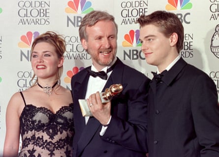 James Cameron, Kate Winslet and Leo pose at the Oscars after Titanic's night of triumph.