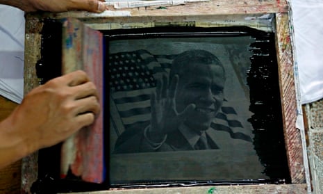 A Burmese screen printer prepares to print an image of Obama on T-shirts 