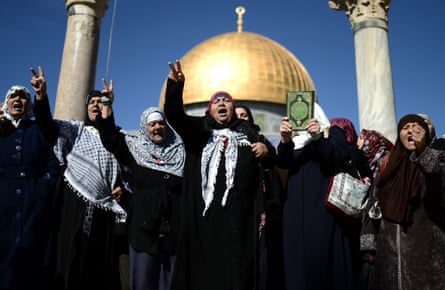 Women shout slogans in front of the Dome of the Rock, near the al-Aqsa mosque where a police raid led to widespread outrage in the Muslim community