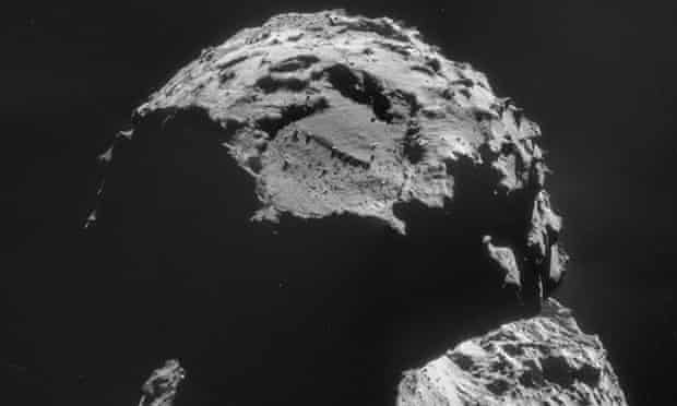 Comet 67P/Churyumov-Gerasimenko, as seen from the Rosetta spacecraft on 6 November. The landing site chosen for Rosetta's robot lander, Philae, can be seen close to the top of the image above a large boulder-filled depression.
