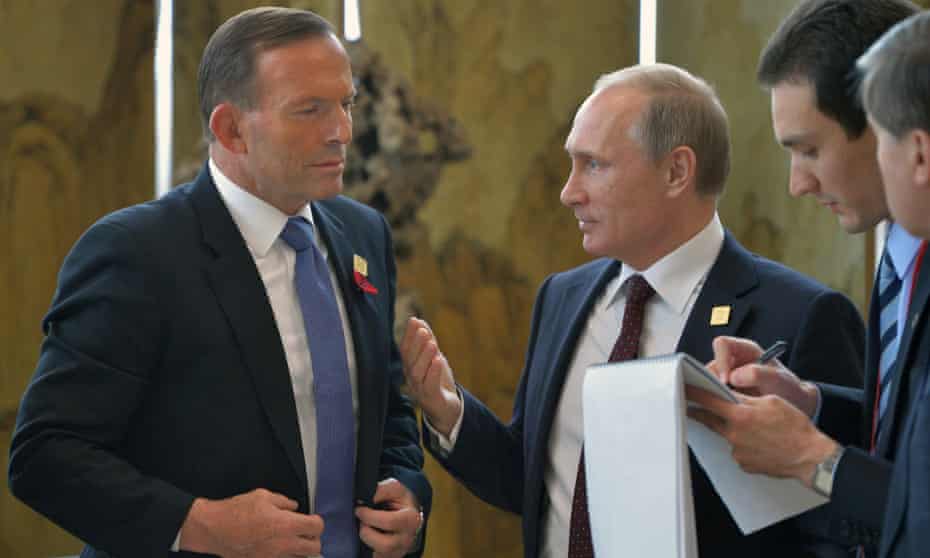 Vladimir Putin and Tony Abbott talk at the Beijing Apec summit.