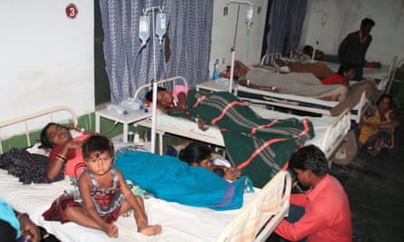 Victims lie on hospital beds. More than 80 women underwent surgery at the camp.