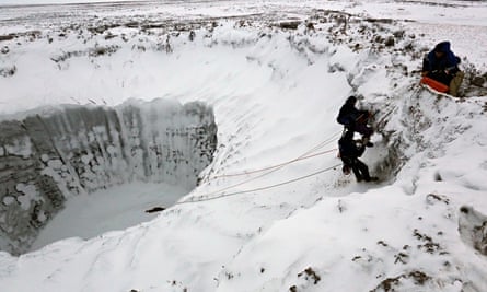 Russian scientists examine crater Yamal peninsula. Photograph: Vladimir Pushkaryov/Itar-TassPhoto/Corbis