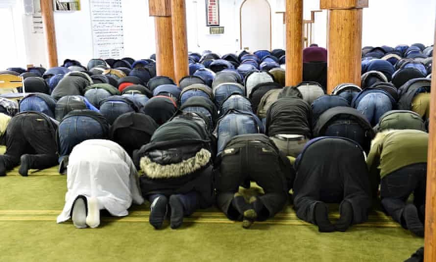 Worshippers at Aarhus's Grimhojvej mosque. Last year 22 young men from the mosque left to become jihadists in Syria.