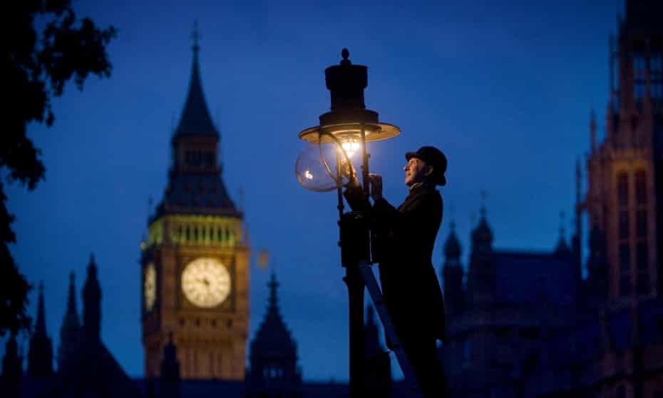 Lamp attendant Martin Caulfield lighting one of London's historic gas street lamps in the traditional fashion to mark the 200th anniversary of gas lighting in the capital in 2007.
