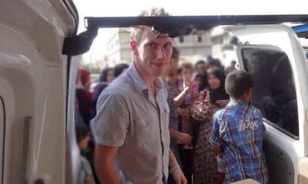 A picture released by his family shows Peter Kassig in front of a truck somewhere along the Syrian border between late 2012 and autumn 2013 as Special Emergency Response and Assistance (SERA) delivered supplies to refugees.