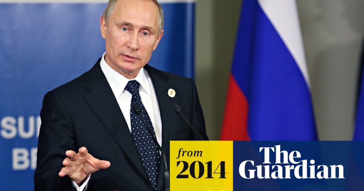 Putin says west is provoking Russia into new cold war as ‘spies’ deported