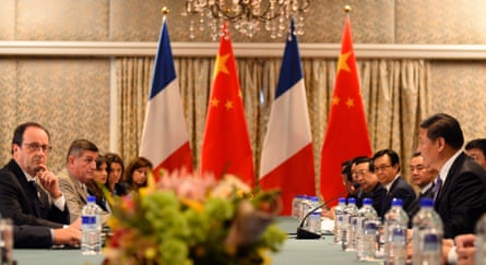 Francois Hollande sits across from China's President Xi Jinping during their bilateral meeting on the sidelines of the G20 summit.
