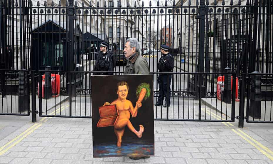 Kaya Mar with his painting of a naked George Osborne brandishing a carrot