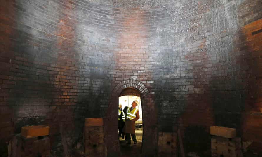 Prince Charles looks inside an old bottle kiln during a visit to the Middleport pottery in 2013.