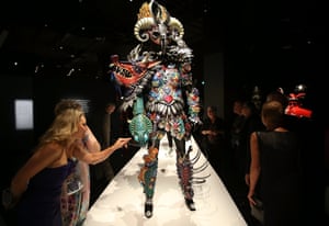 Visitors look at a costume at Auckland Museum's World of Wearable Art exhibition, opening tomorrow