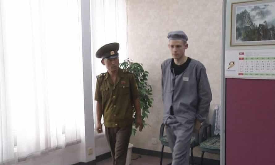 This image taken from video shows Matthew Miller in North Korea on 24 September. He told media he was being forced to dig in fields for eight hours a day.