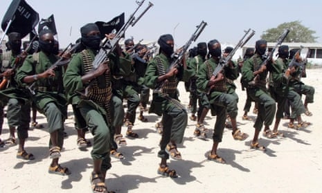 Al-Shabaab fighters perform military exercises.