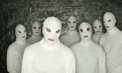 The anonymous members of the Melbourne outfit TISM.