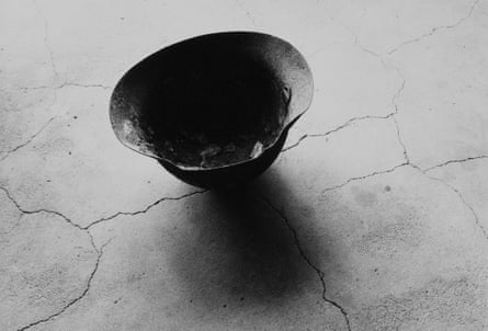 Steel Helmet with Skull Bone Fused by Atomic Bomb, Nagasaki, 1963, by Shomei Tomatsu
