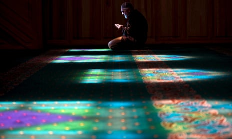A Crimean Tatar prays at a mosque in Ukraine. The Russian annexation of Crimea has opened old wounds among the Tatars.