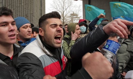 Crimean Tatar protesters during a demonstration near the Parliament building in Simferopol. Ukraine