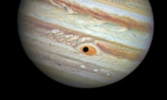This happened on April 21, 2014, when Hubble was being used to monitor changes in Jupiter's immense Great Red Spot (GRS) storm. During the exposures, the shadow of the Jovian moon Ganymede swept across the center of the GRS. This gave the giant planet the uncanny appearance of having a pupil in the center of a 10,000-mile-diameter "eye."