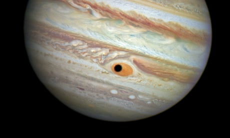 Jupiter's gaseous eye, a moon impaled and a Halloween sun – in pictures