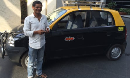 Wasim with his taxi.