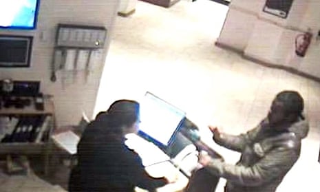 CCTV still issued by police of a defendant booking a room in a Premier Inn in Bristol,