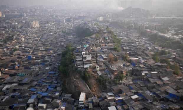 A slum surrounds a noll known to locals as ‘Hill 3’ in Mumbai’s northern slums.