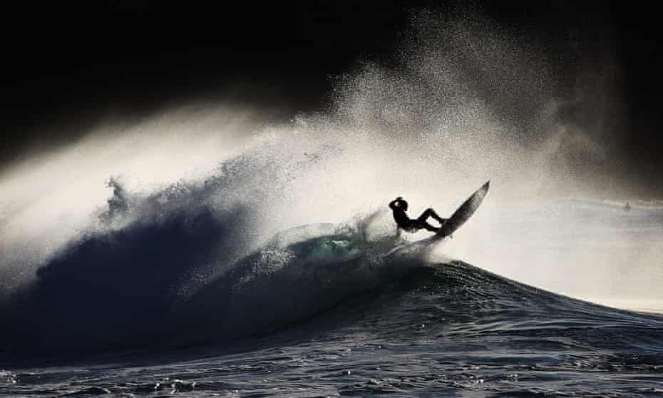 A surfer falls from his board in Sydney, Australia.