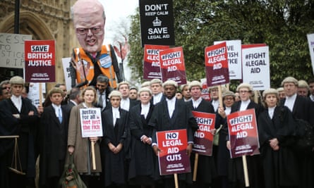 Barristers and solicitors demonstrating against legal aid cuts outside Parliament in March this year.
