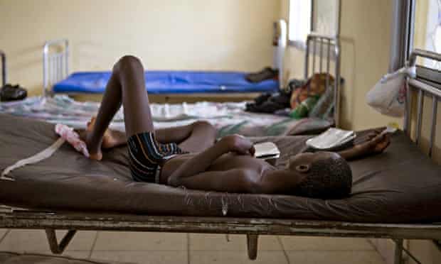A child suffering from the Ebola virus receives treatment in Makeni, Sierra Leonee