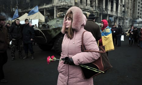 A woman walks through Maidan Square in Kiev, Ukraine.